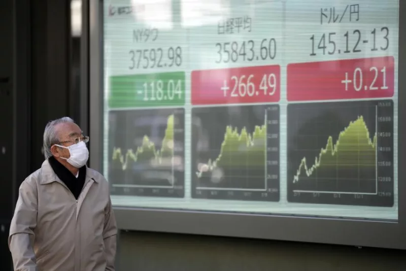 Japanese Stocks Pause as Stimulus Hopes Fade and Investor Caution Rises